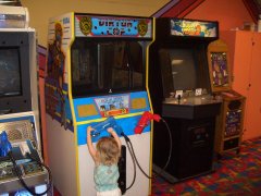 A young gamer tries her rail-shooting skills in V…
